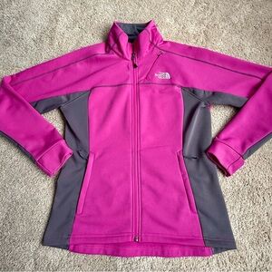 The North Face women's soft shell jacket in pink and grey.